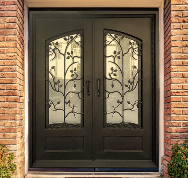 custom iron door with branch pattern and frosted glass panels