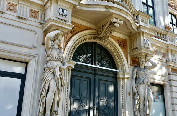 Estate iron doors with matching transom above the entry