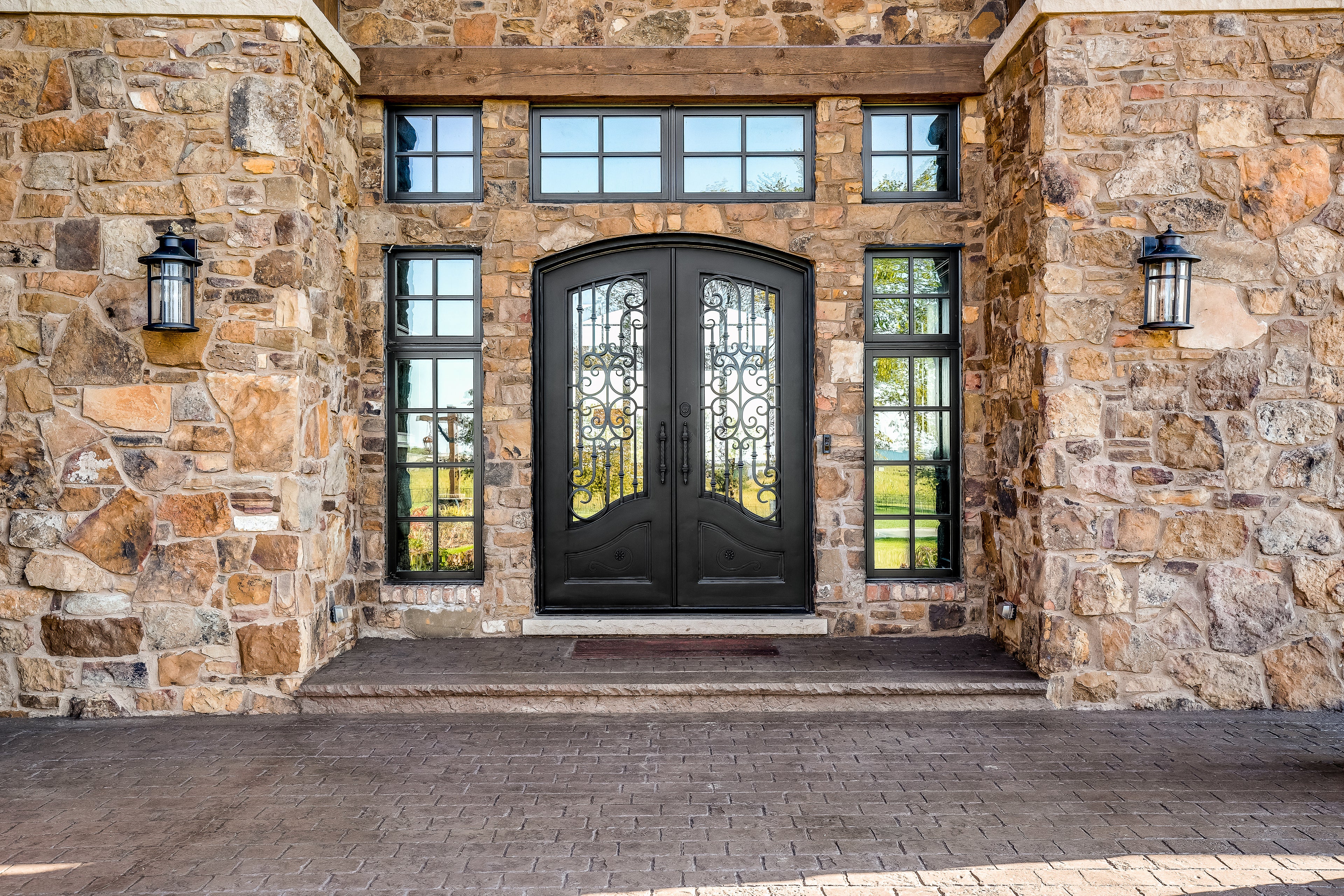 Modern slim line wrought iron door with clear glass
