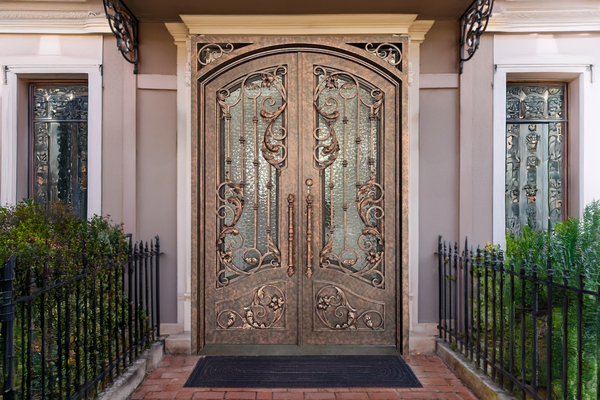 Ornate iron doors with decorative grille detail